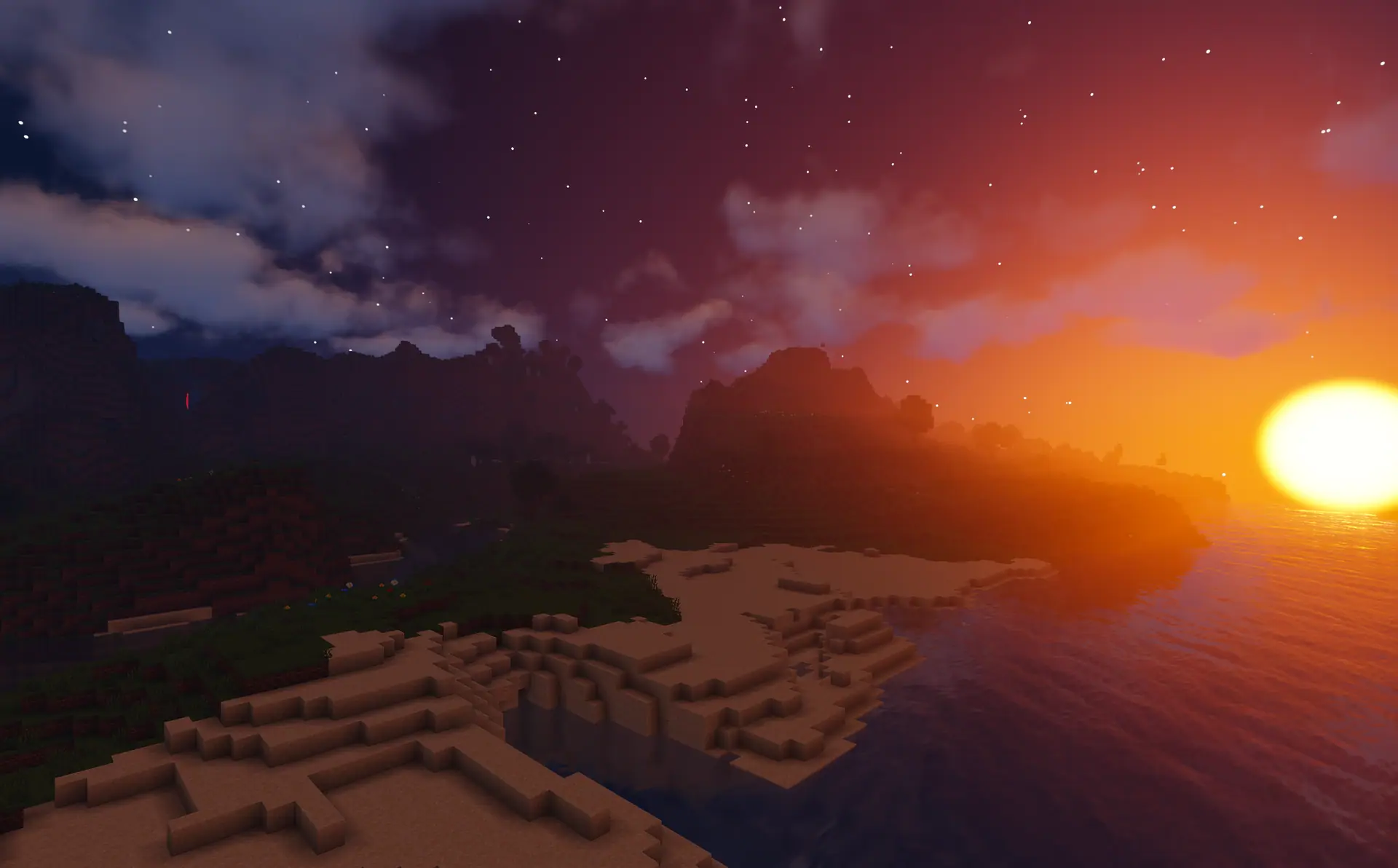 De zon zakt in de oceaan naast een kustlijn in de survivalwereld